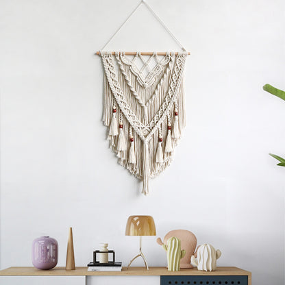Hand-woven macrame wall hanging with decorative tassels