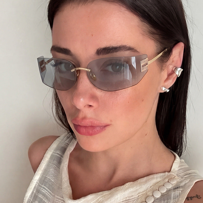 Women's futuristic designer sunglasses with unusual frame and UV protection Skanto
