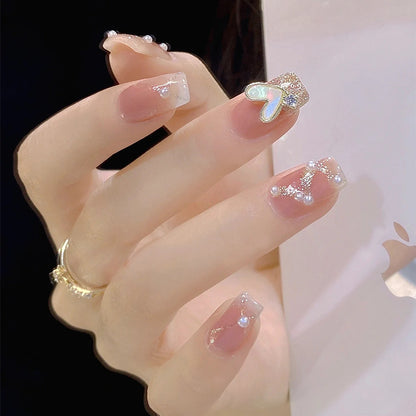Artificial nail set with elegant pearl and glitter accents Acalora
