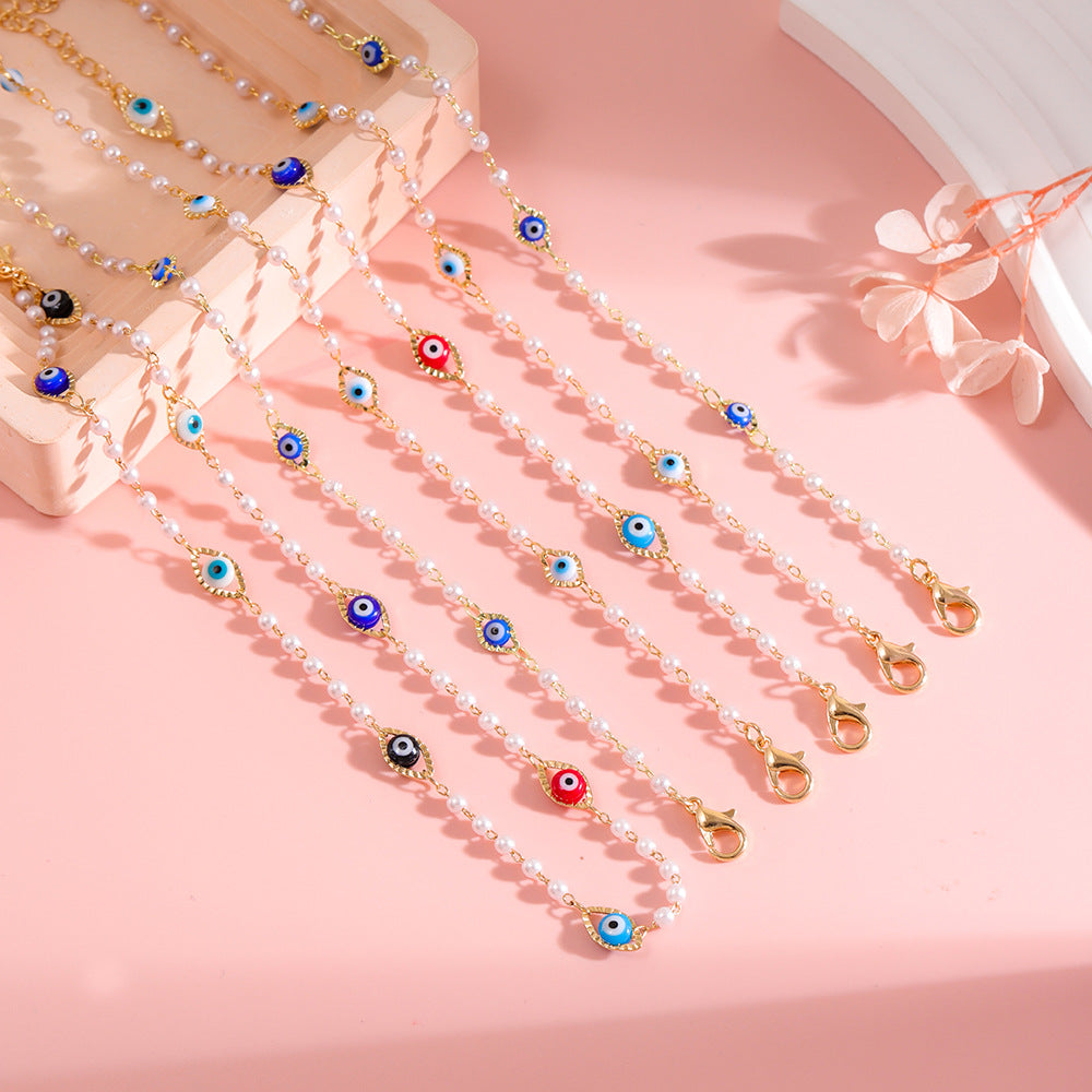 Elegant Pearl and Eye Charm Necklace Acalora