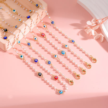 Elegant Pearl and Eye Charm Necklace Acalora