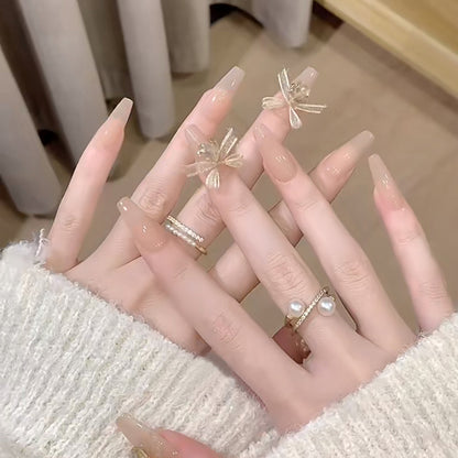 Artificial nail set with elegant 3D patterns and delicate accents Acalora