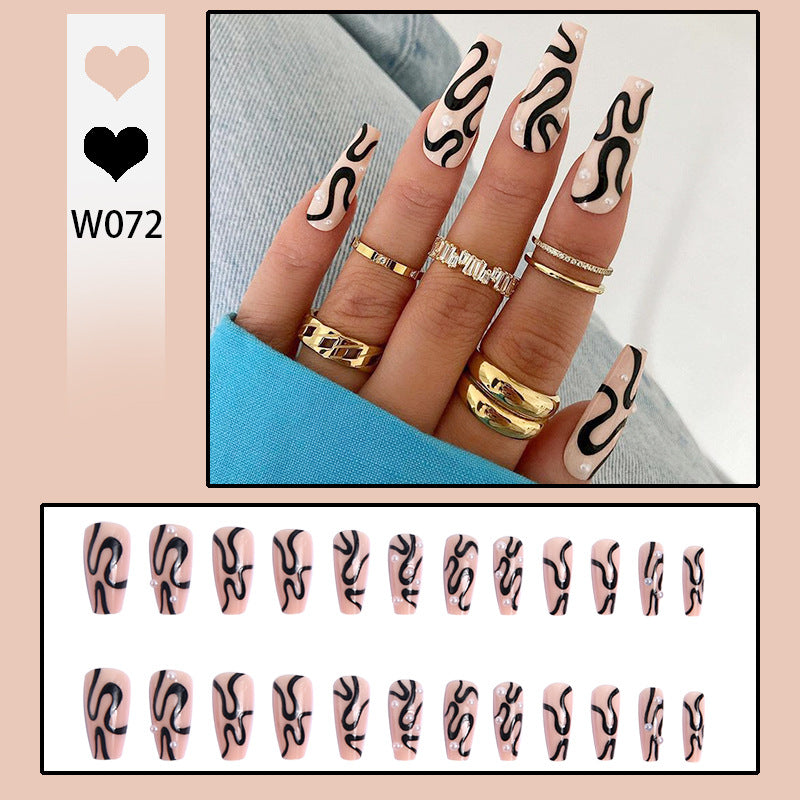 Artificial nail set with unique wave designs and glamorous accents Acalora