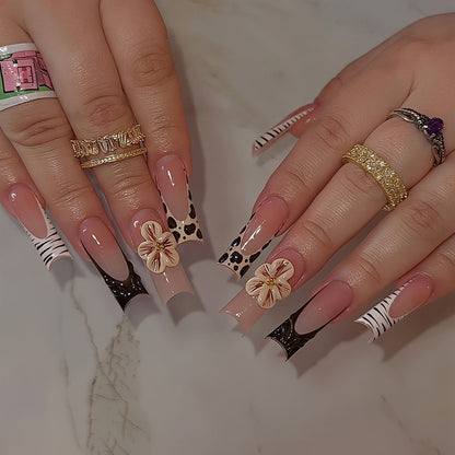 Artistic Press-On Nail Art Tips with Floral and Animal Print Designs Acalora