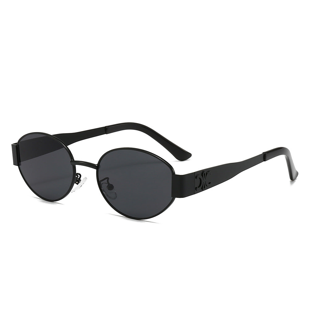 Women's designer sunglasses with elegant oval frame and unique accents Bowlift