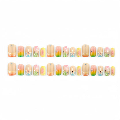 Artificial nails in vibrant floral design with glitter accents Acalora