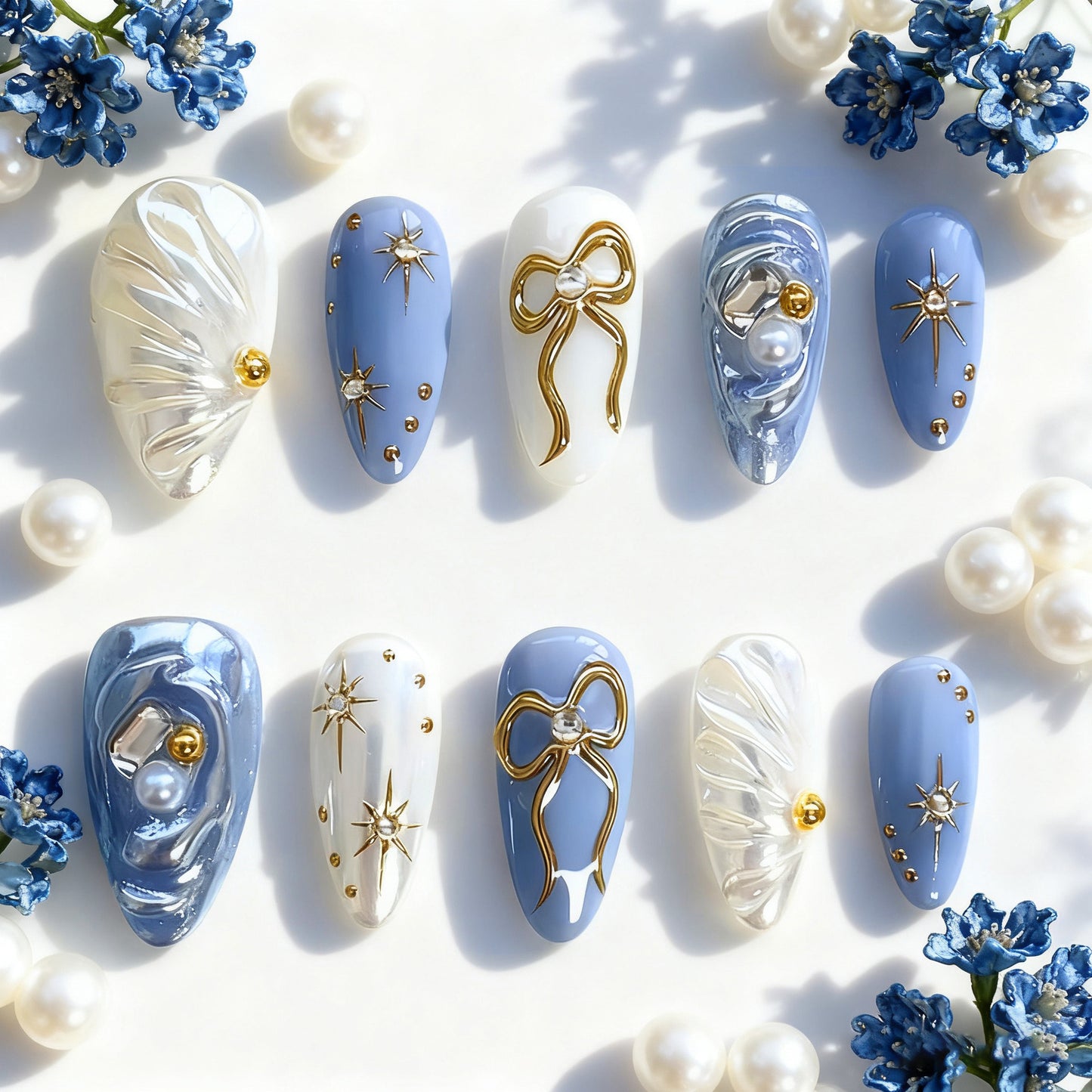 Acrylic nail set with glamorous golden accents Acalora
