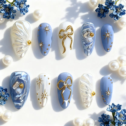 Acrylic nail set with glamorous golden accents Acalora