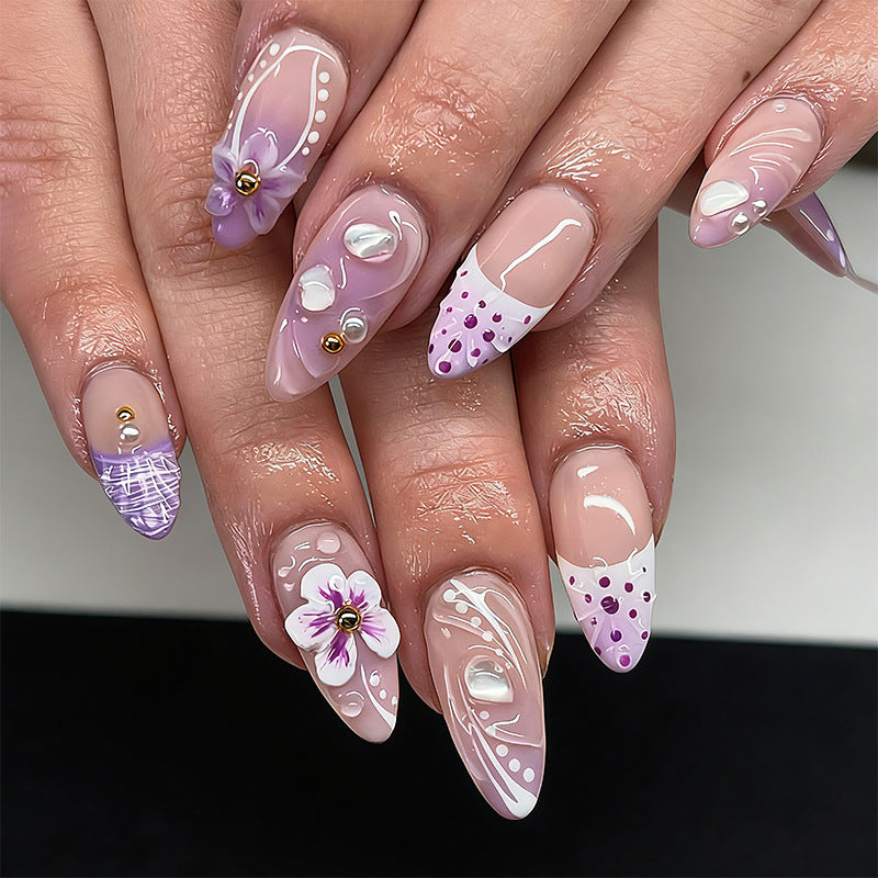 Artificial nail set with exotic floral and glitter accents Acalora