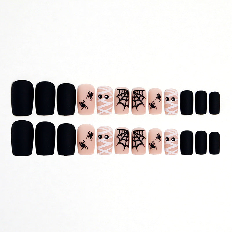 Artificial nail set with creepy Halloween motif and delicate spider designs Acalora