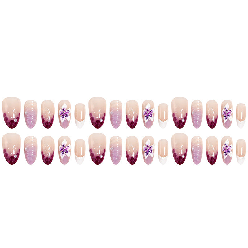 Artificial nail set with elegant ombre design and floral accents Acalora