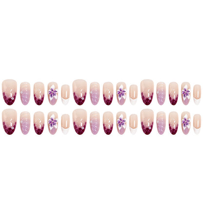 Artificial nail set with elegant ombre design and floral accents Acalora