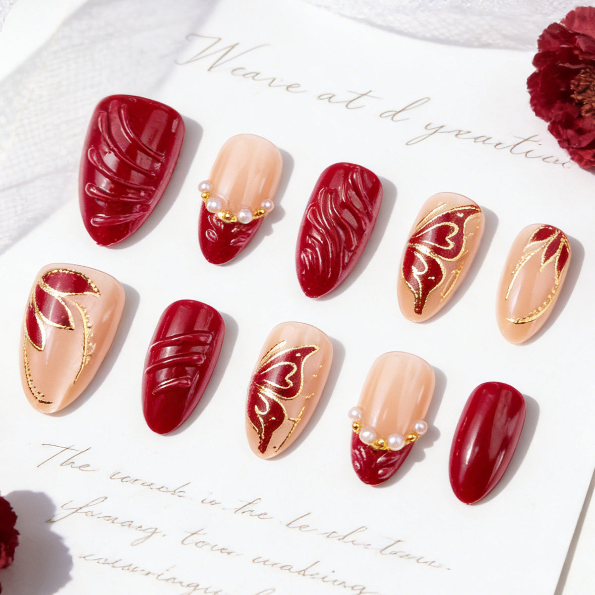 Artificial nail set with filigree golden decorations and romantic heart details Acalora