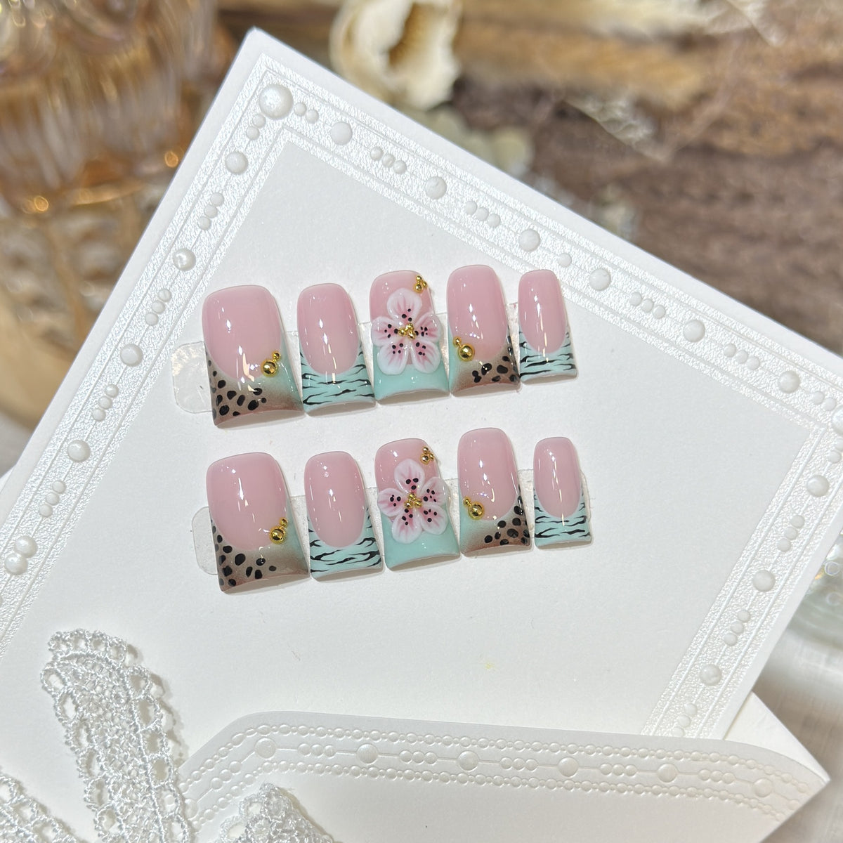 Artistic Press-On Nail Set with Floral and Patterned Design Acalora