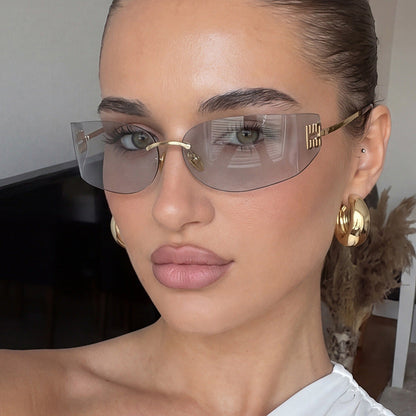 Women's futuristic designer sunglasses with unusual frame and UV protection Skanto
