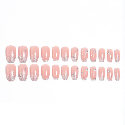 Acrylic nail set with extravagant glitter and crystal embellishments Acalora