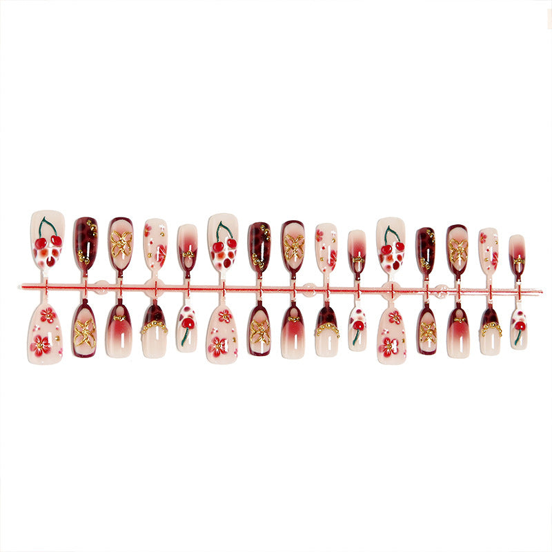 Artificial nail set with elegant floral designs and glitter effect Acalora