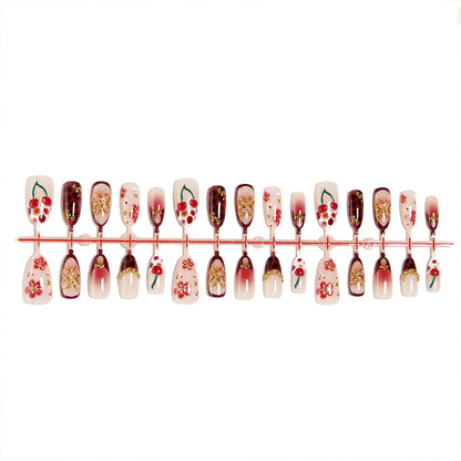 Artificial nail set with elegant floral designs and glitter effect Acalora