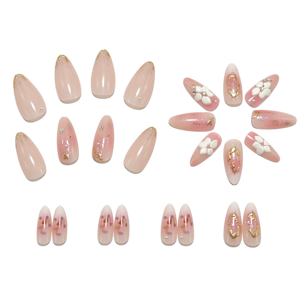 Art nail design with floral accents and glitter tips Acalora