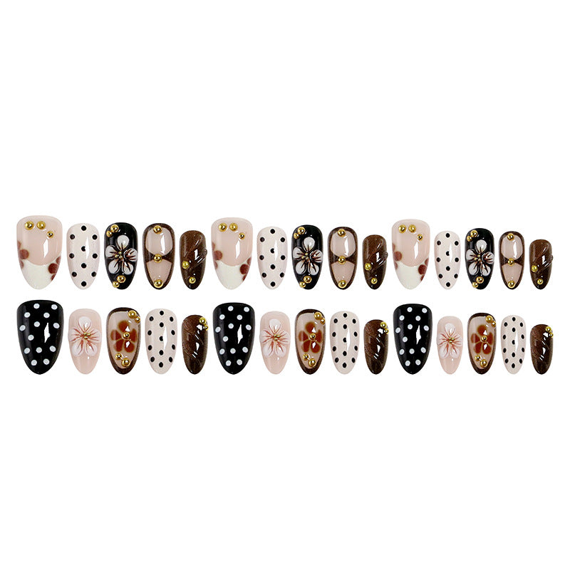 Art nail set with floral accents and elegant 3D decorations Acalora