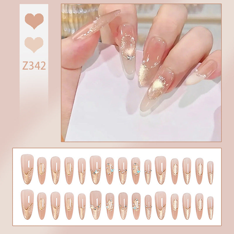 Art nail set with elegant gold glitter design Acalora