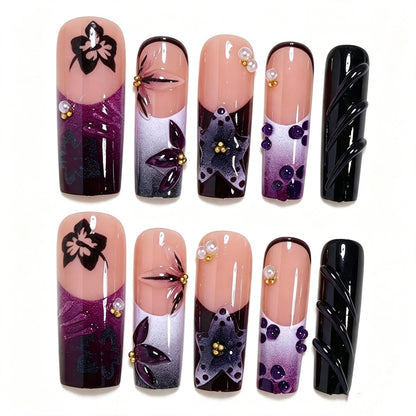 Artistic Long Nail Design with Floral Accents Acalora