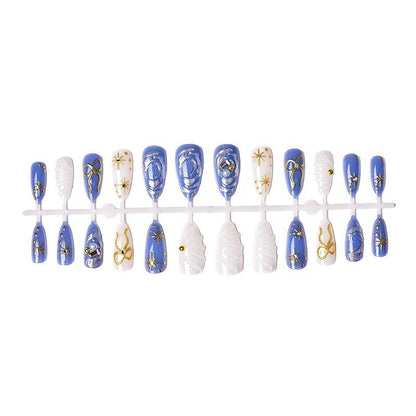 Acrylic nail set with glamorous golden accents Acalora