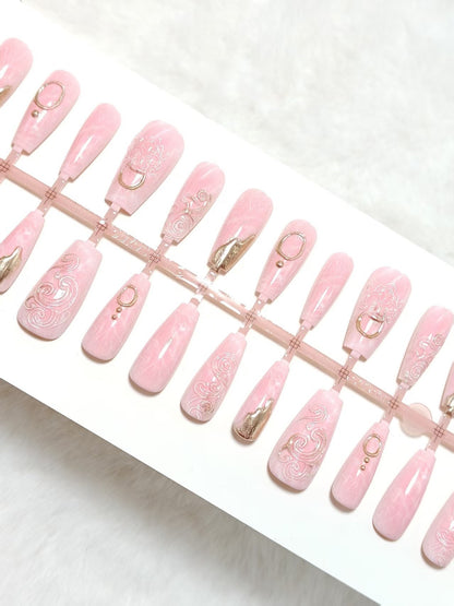 Artificial nails with elegant gold embellishments Acalora