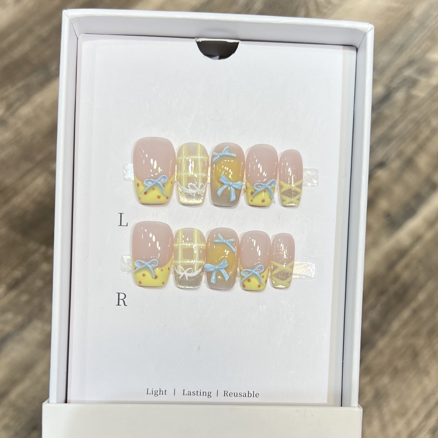 Decorative Press-On Nail Art Set with Charming Bow and Pattern Designs Acalora