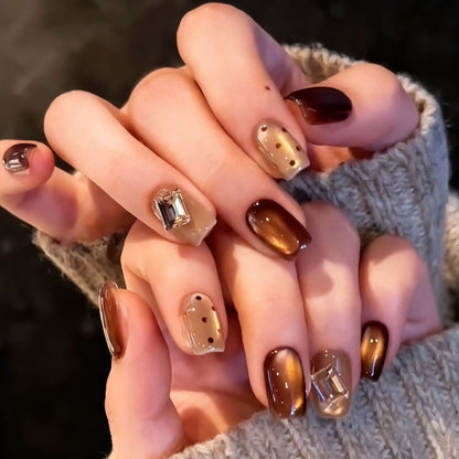 Glamorous artificial nails with creative embellishments Acalora