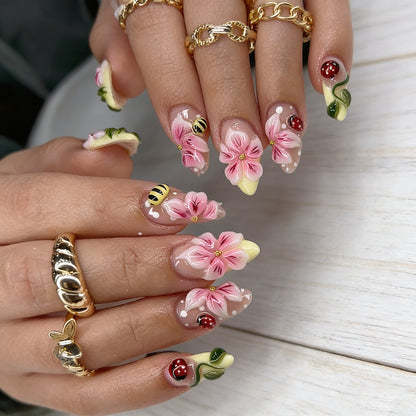 Artificial nail set with floral 3D applications and gloss finish Acalora