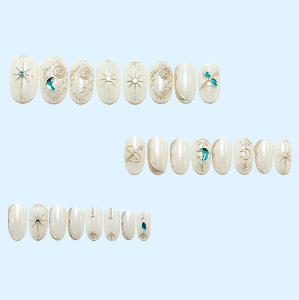 Artificial nails with elegant jewelry embellishments Acalora