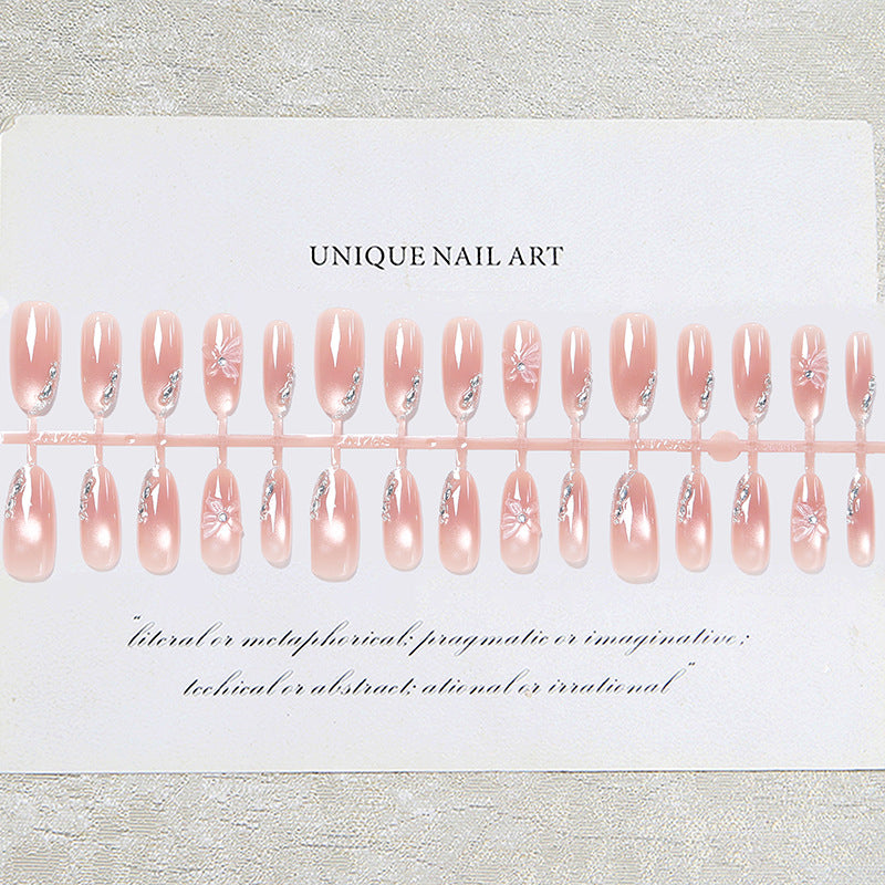 Acrylic nail set with elegant ombre design and sparkling accents Acalora