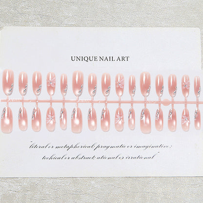 Acrylic nail set with elegant ombre design and sparkling accents Acalora
