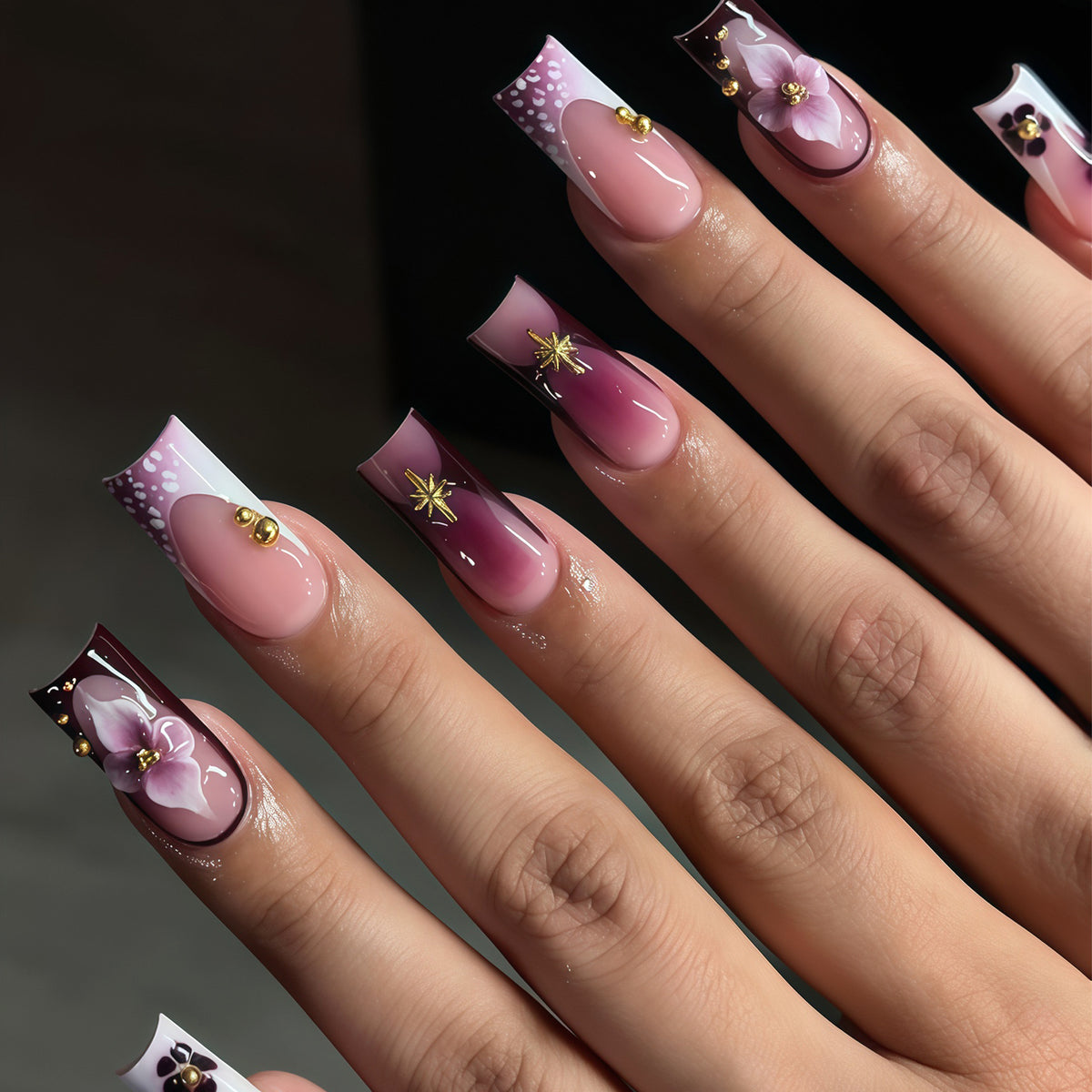 Artistic Acrylic Nail Design Set with Floral and Gold Accents Acalora