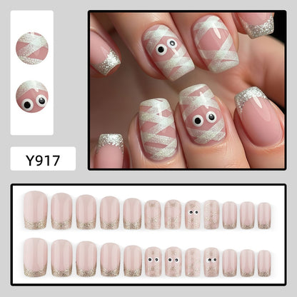 Artificials nails with playful eye design and glitter tips Acalora