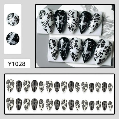 Artificial nails in a unique winter design with snow and reindeer motifs Acalora