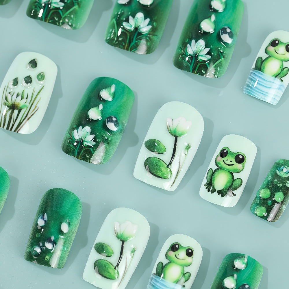Creative art nails with frogs and plant details Acalora