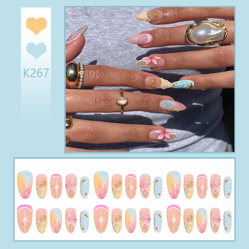 Artificial nail set with elegant floral design and glitter accents Acalora
