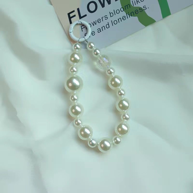 Elegant Pearl and Black Bead Charm Bracelet Acalora