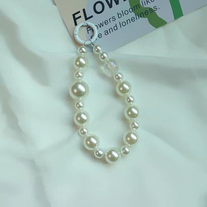 Elegant Pearl and Black Bead Charm Bracelet Acalora