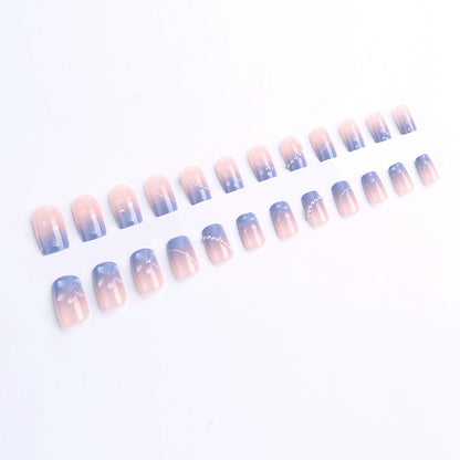 Nail set with elegant floral accents and glitter embellishments Acalora