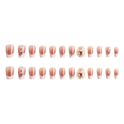 Artificial nail set with elegant floral decorations and glitter accents Acalora