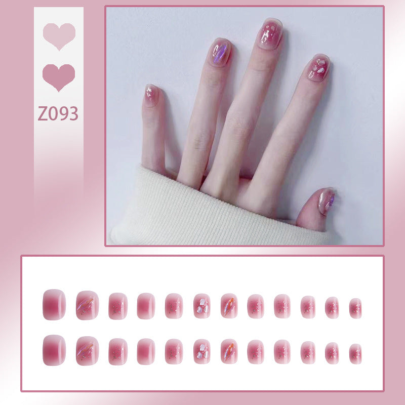 Artificial nails with delicate glitter design and floral accent Acalora