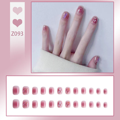 Artificial nails with delicate glitter design and floral accent Acalora