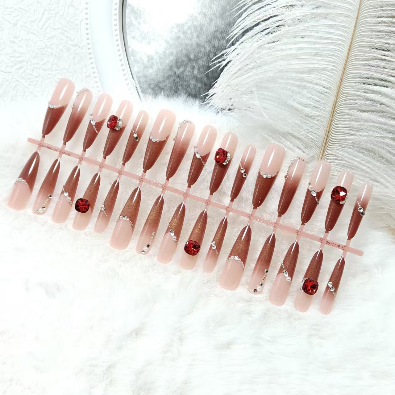 Artificial nails with luxurious 3D decorations and glamorous accents Acalora