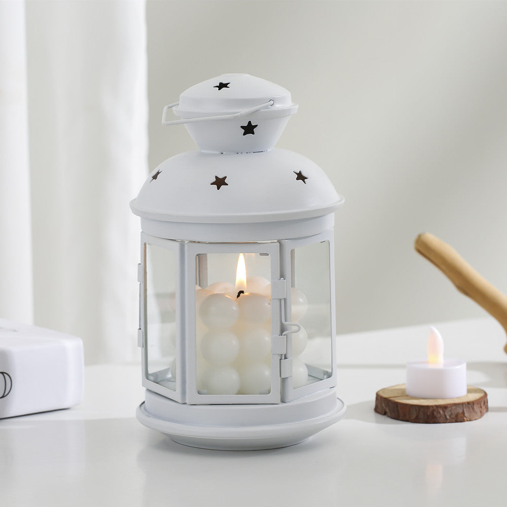 Vintage-Inspired Cylindrical Metal Tea Light Lantern with Star Vent Cutouts and Hinged Glass Door Acalora