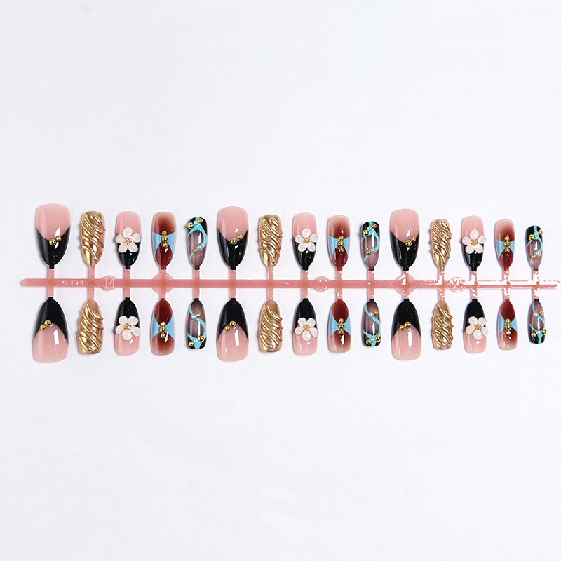 Artificial nail set with filigree floral decorations and glamorous accents Acalora