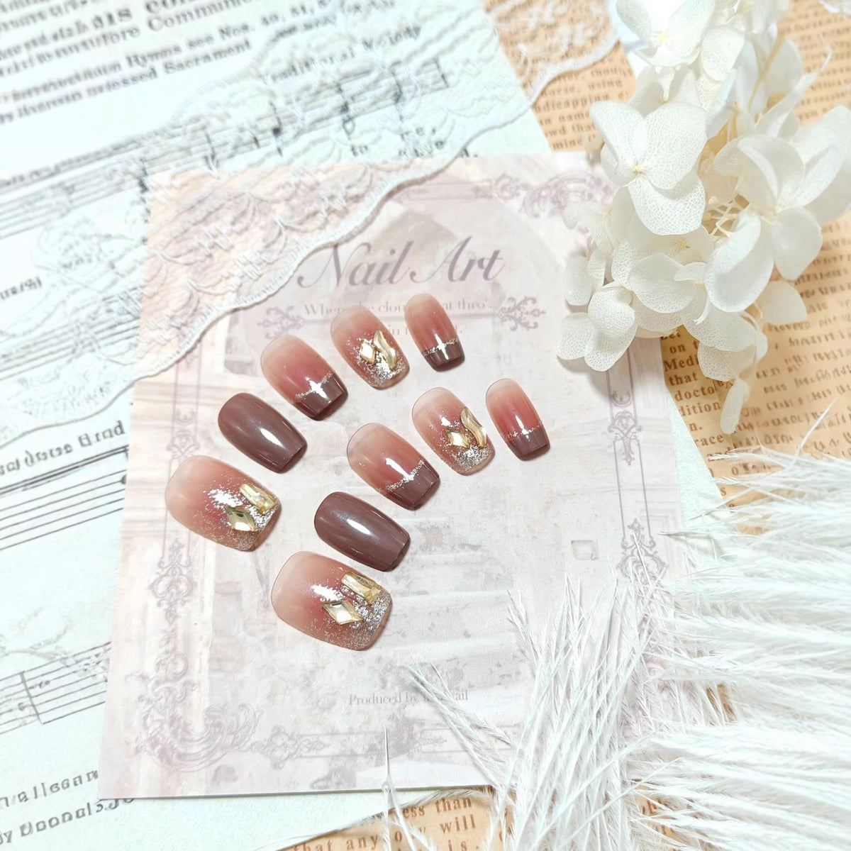 Acrylic nails in elegant ombre design with glitter elements Acalora