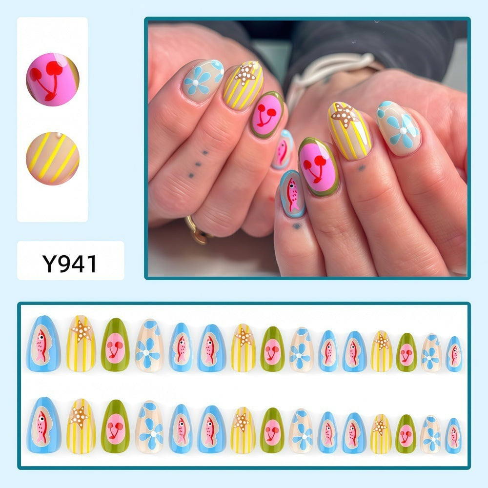 Artificial nails with playful fruit and flower motif Acalora
